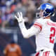 Jan 2, 2022; Chicago, Illinois, USA; New York Giants quarterback Mike Glennon (2) drops back to pass against the Chicago Bears during the second half at Soldier Field.